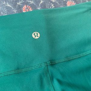 Wunder train Lululemon leggings in dark emerald colour. Size 10.